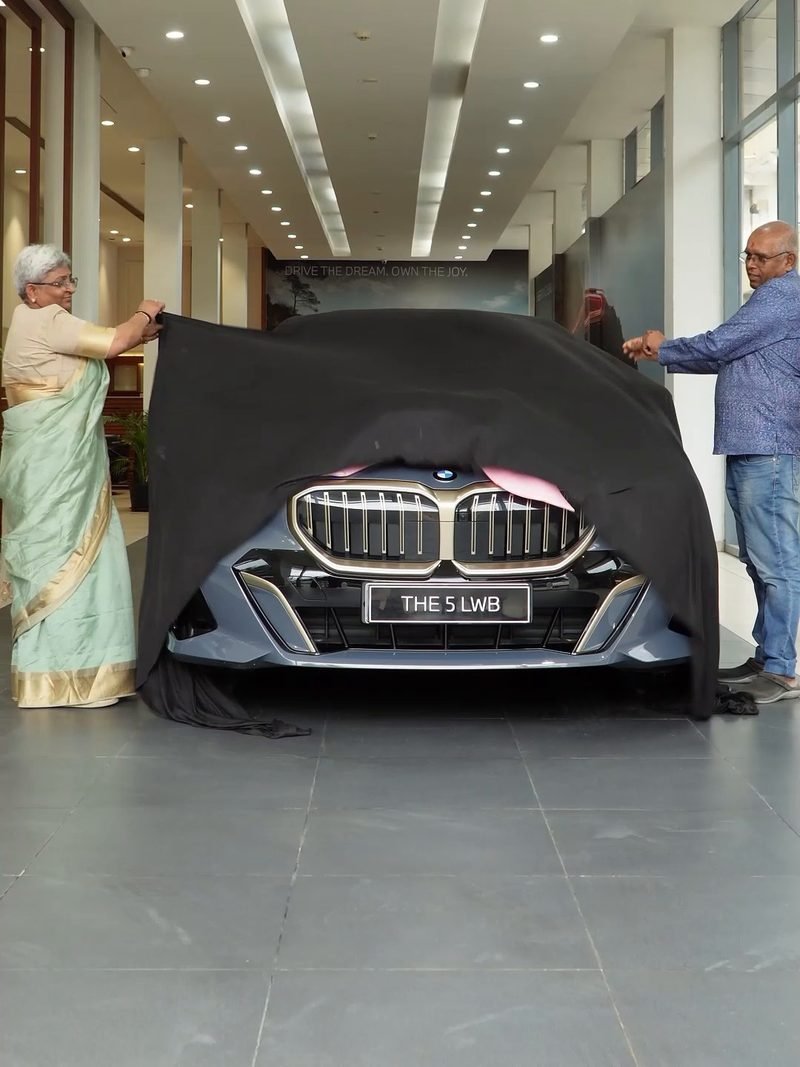 Car being unveiled at a showroom