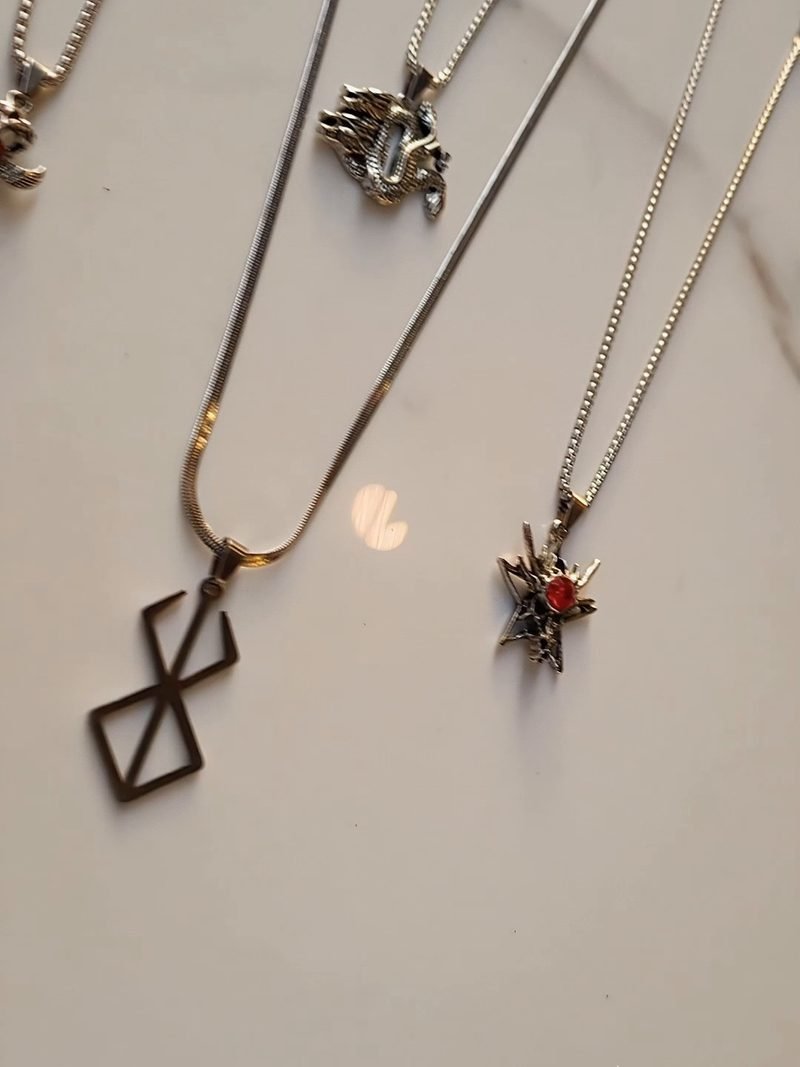 Silver pendant necklaces laid flat